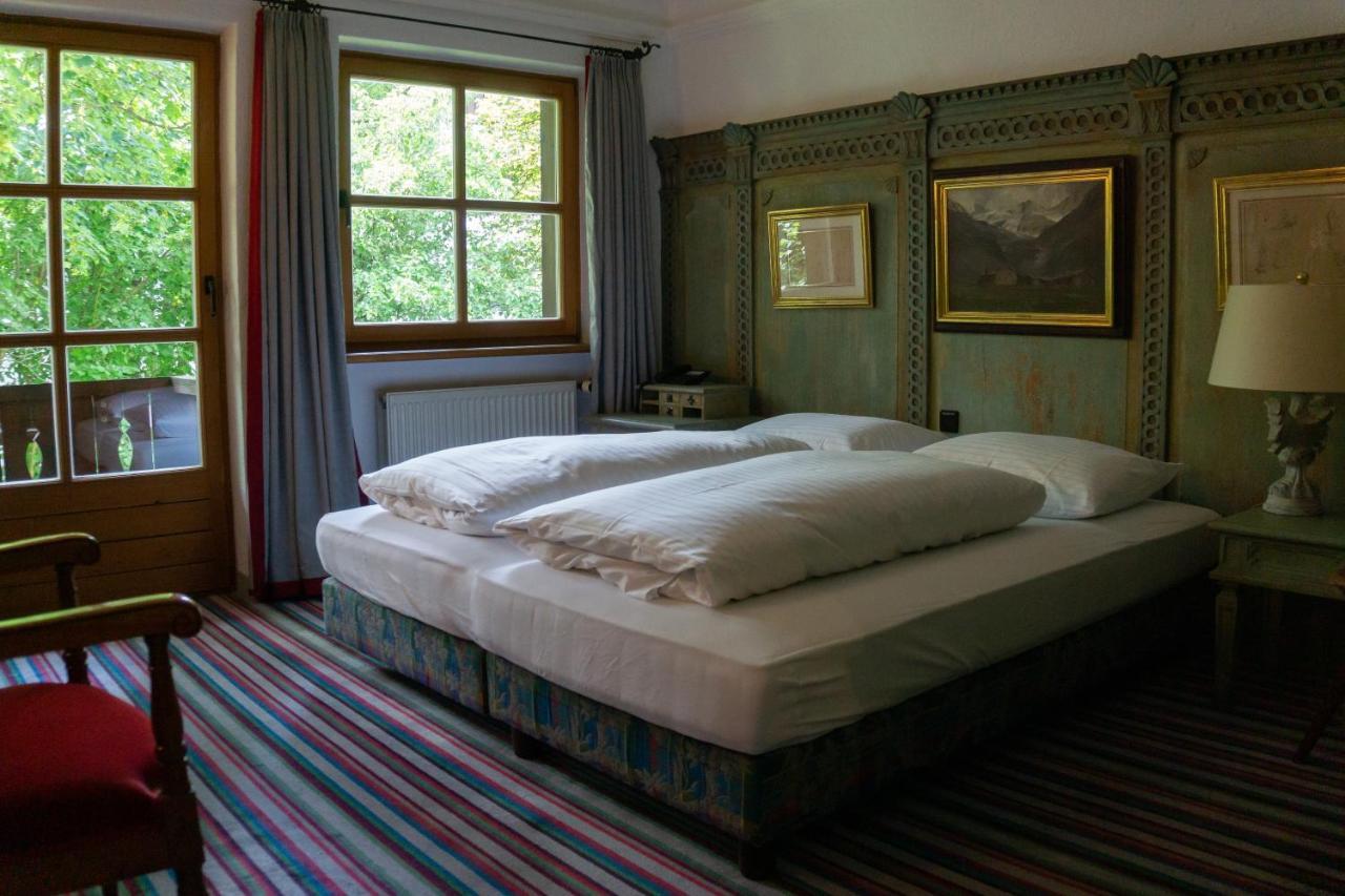 Hotel Schrenkhof Unterhaching Bagian luar foto