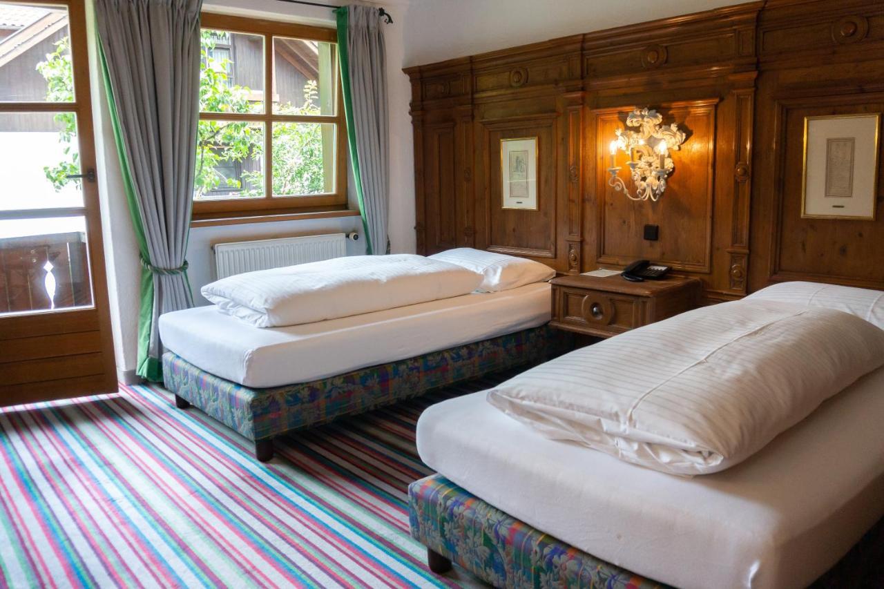 Hotel Schrenkhof Unterhaching Bagian luar foto