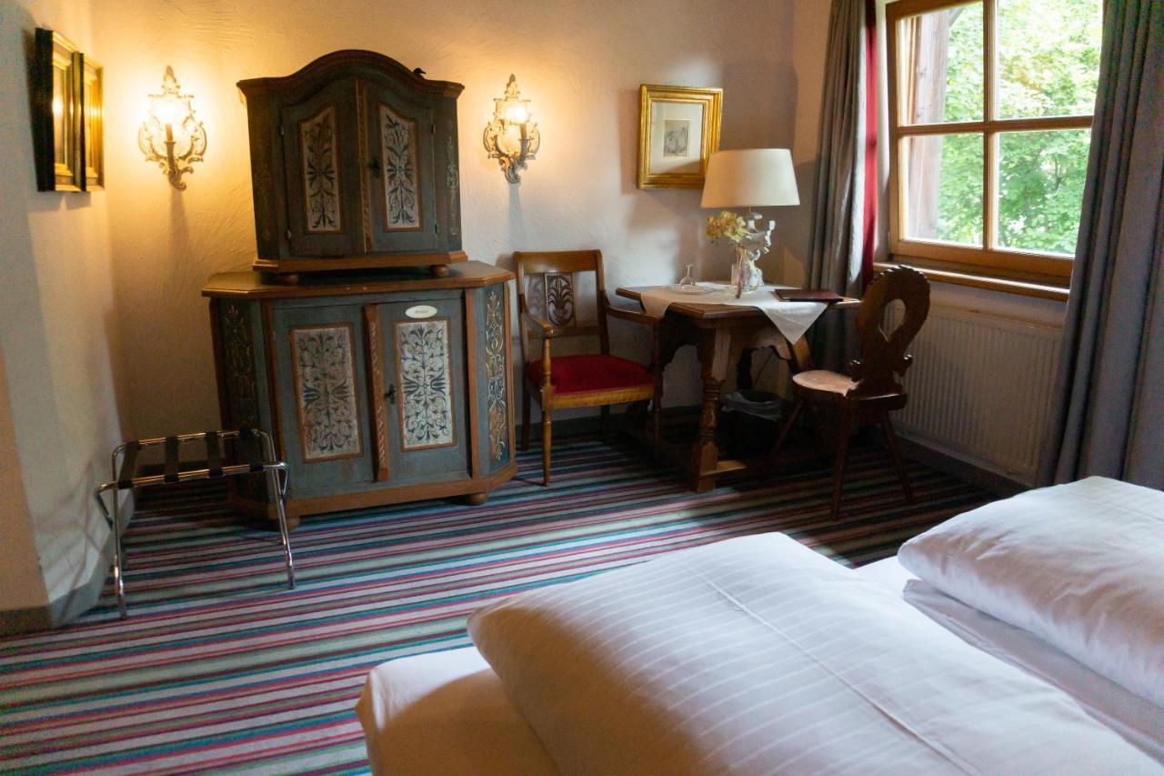 Hotel Schrenkhof Unterhaching Bagian luar foto