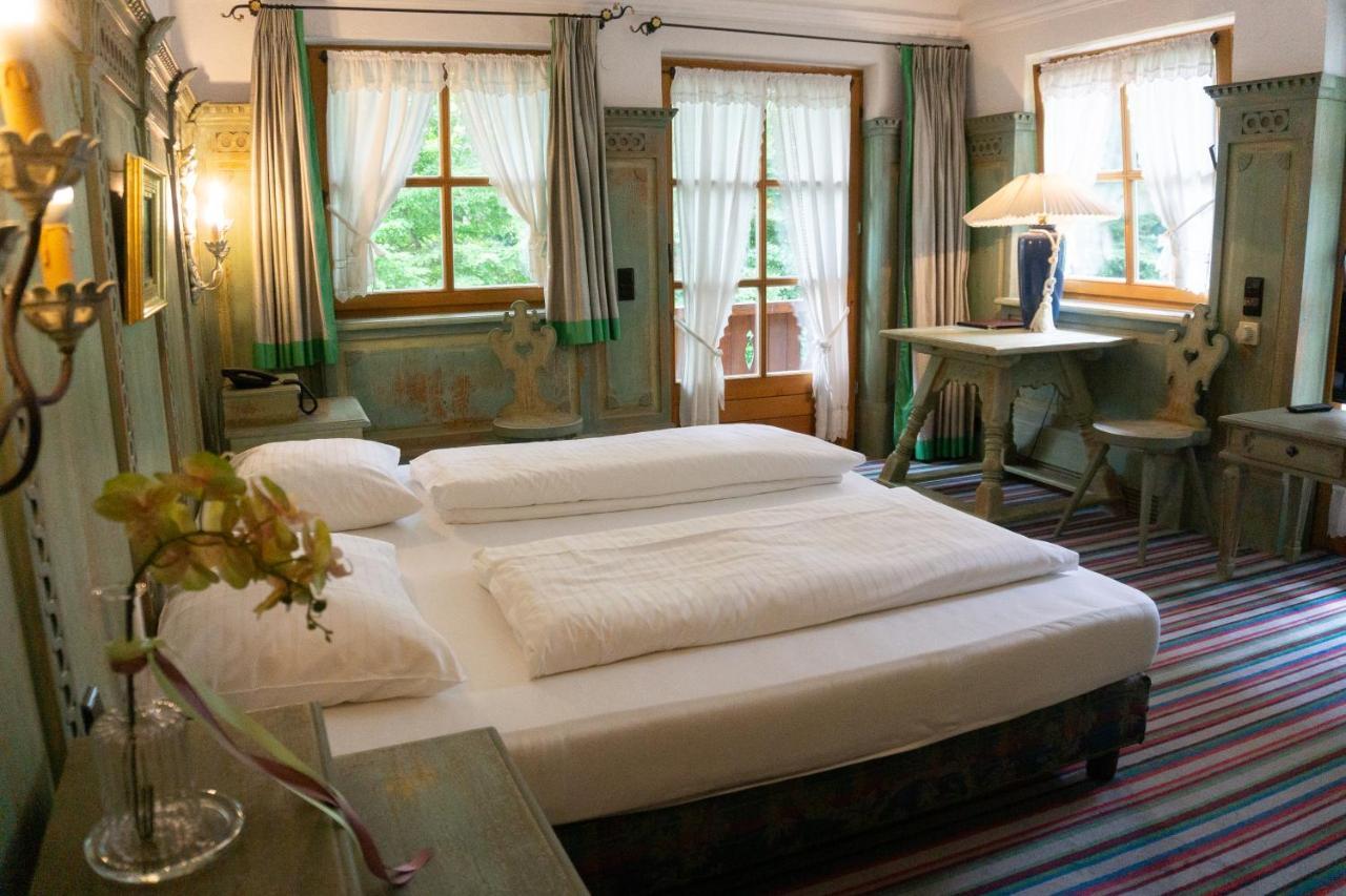 Hotel Schrenkhof Unterhaching Bagian luar foto