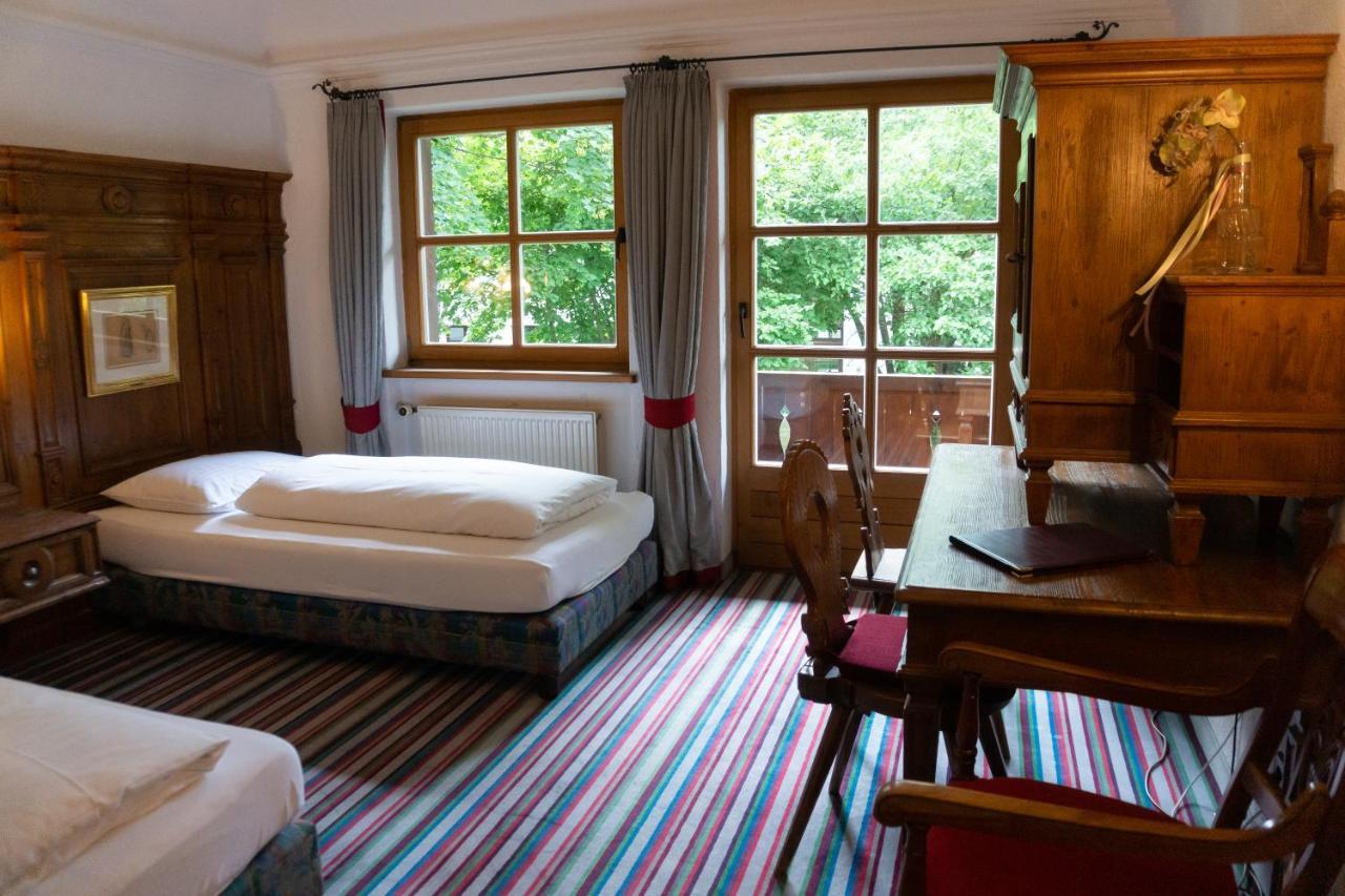 Hotel Schrenkhof Unterhaching Bagian luar foto